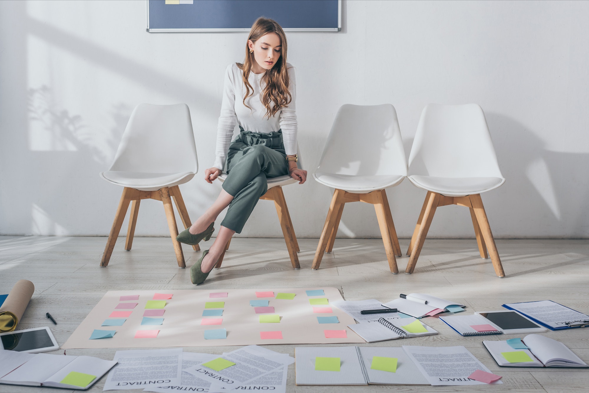 attractive-scrum-master-sitting-on-chair
